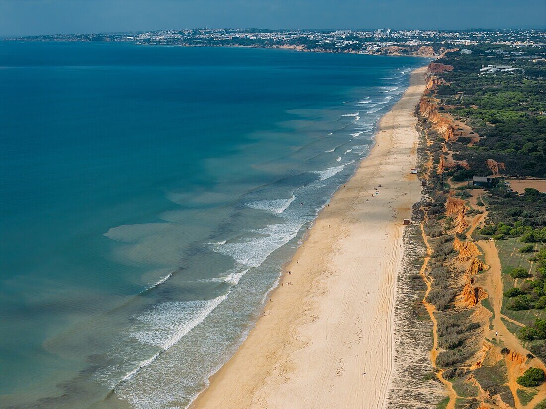 Aerial drone view of Falesia Beach in Vilamoura, Algarve, Portugal