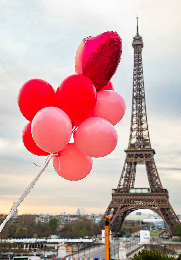 Pink and red balloons in front of Eiffel tower, Paris, France