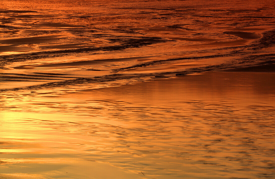 Beach reflections, Dunraven Bay, Southerndown, Vale of Glamorgan, South Wales, United Kingdom