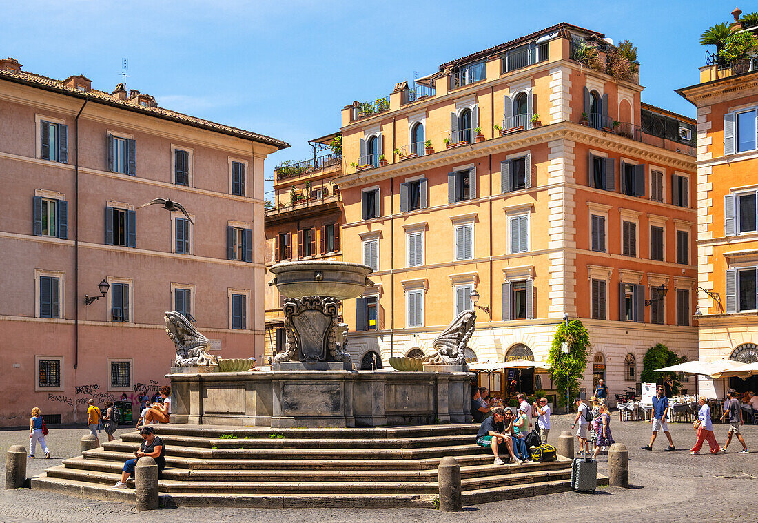 Fountain in Piazza Santa Maria in Trastevere, 8th century, possibly the oldest of Rome fountains, Rome, Lazio, Italy