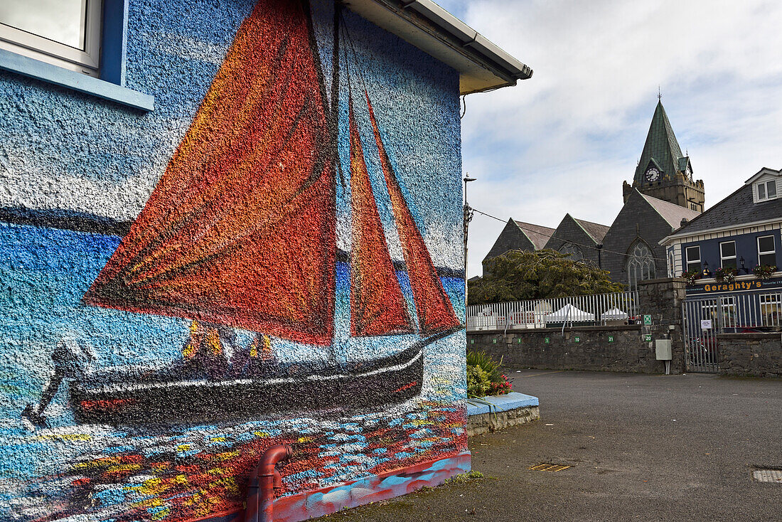 Mural painting in the courtyard of a school used for parking on weekends, Galway, Connemara, County Galway, Connacht, Republic of Ireland