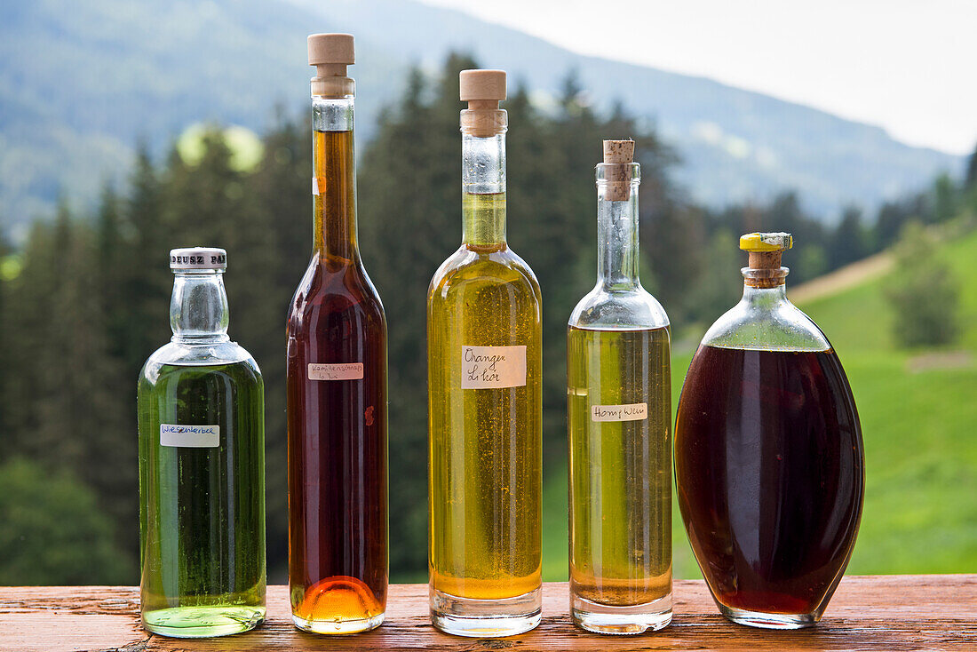 Fruit brandies (schnapps) display, Unterstein, Farm Holidays, Villabassa /Niederdorf, Puster Valley, South Tyrol (Alto Adige), Italy