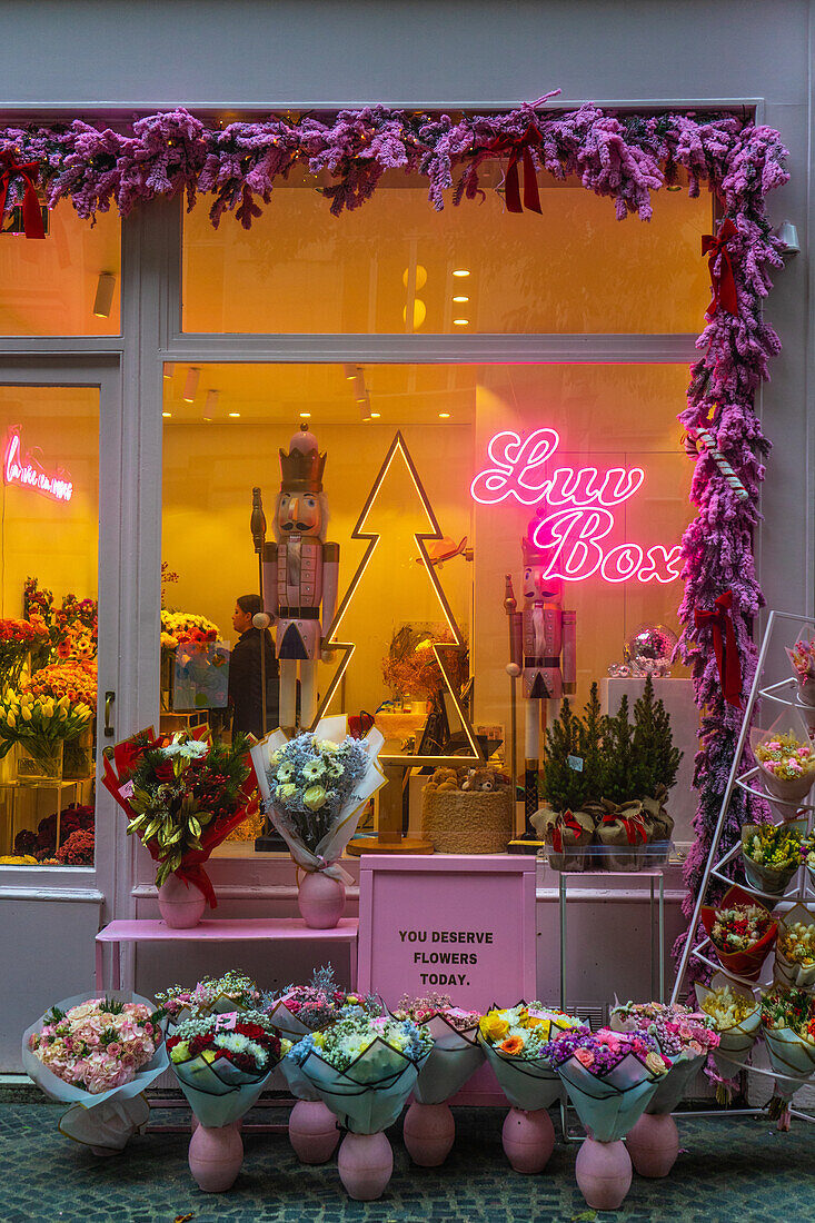 Pink flower shop Luv Box on Rue Bachaument at Christmas, Paris, France