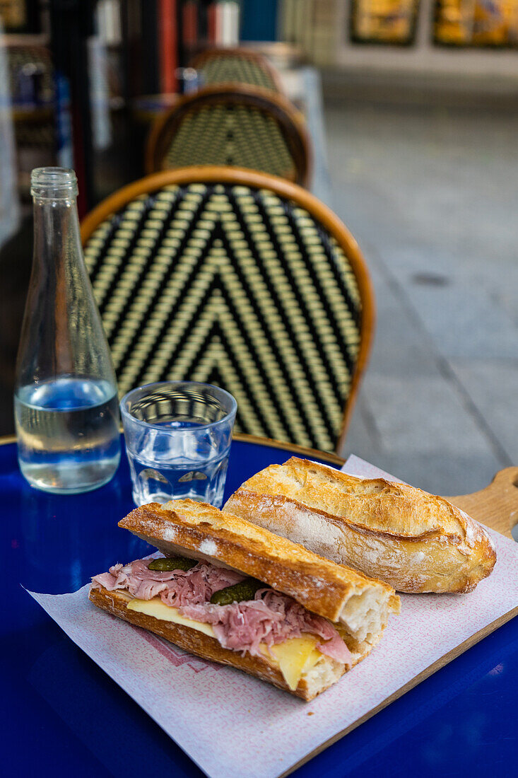 Ham and cheese baguette at a cafe in Paris, France