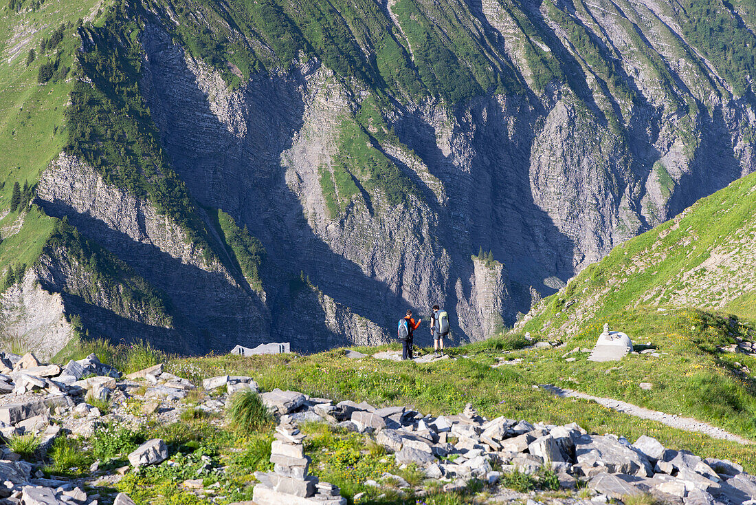 People hiking on Niesen mountain, Canton of Bern, Switzerland