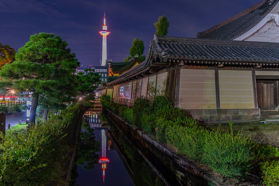 View of Nidec Kyoto Tower from Higashi Hongan-ji Temple at night, Shimogyo Ward, Higashishiokoji Kamadonocho, Kyoto, Honshu, Japan