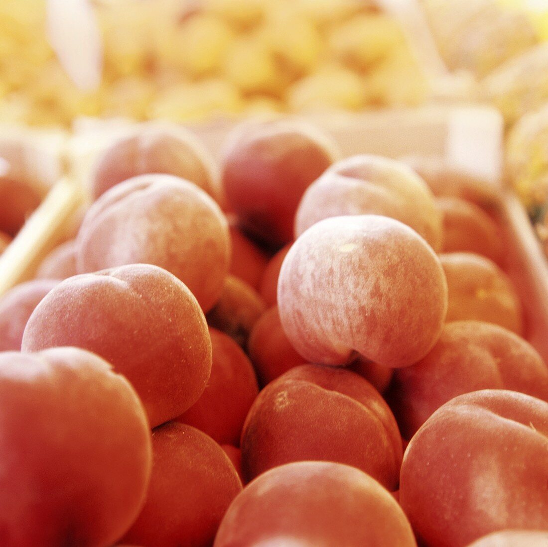 Red peaches in a crate