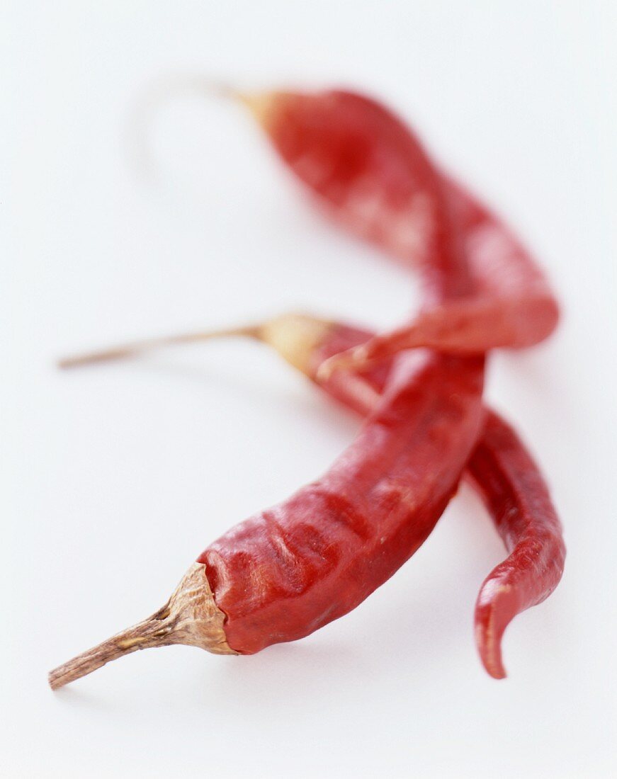 Three dried chili peppers