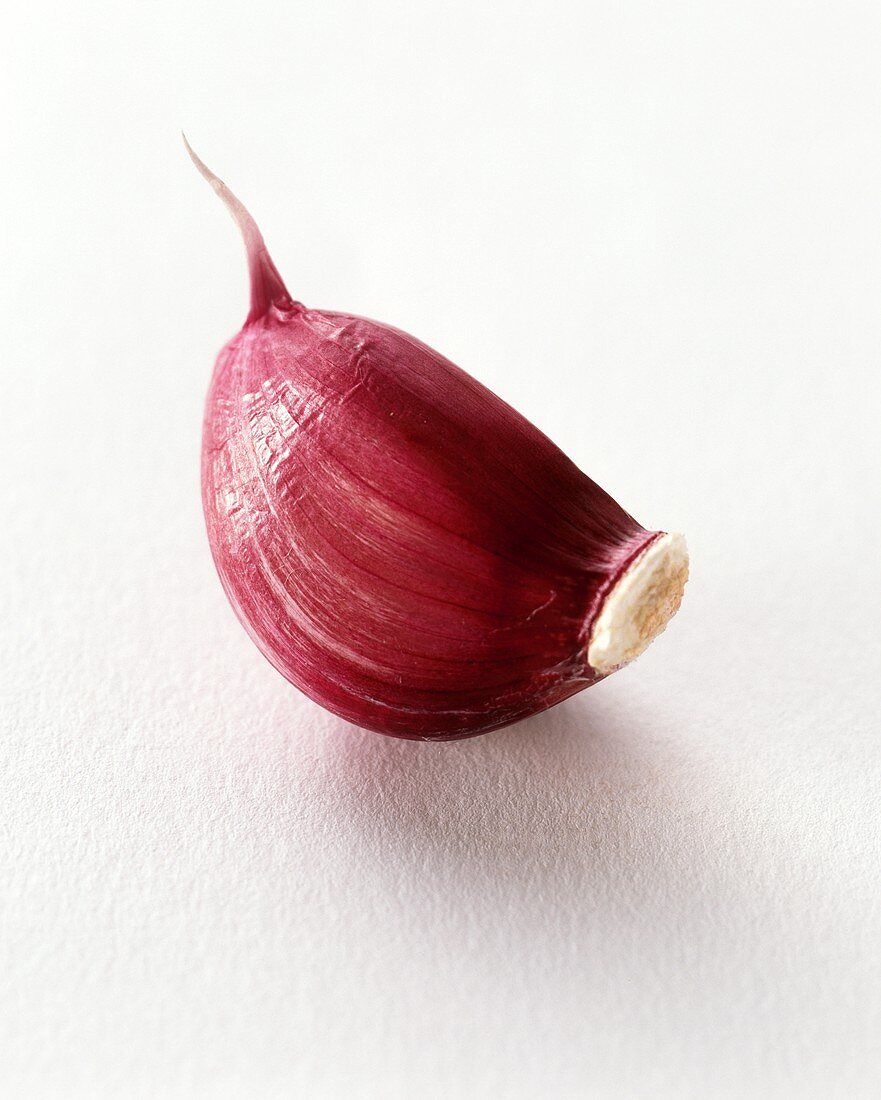 Garlic clove with red skin