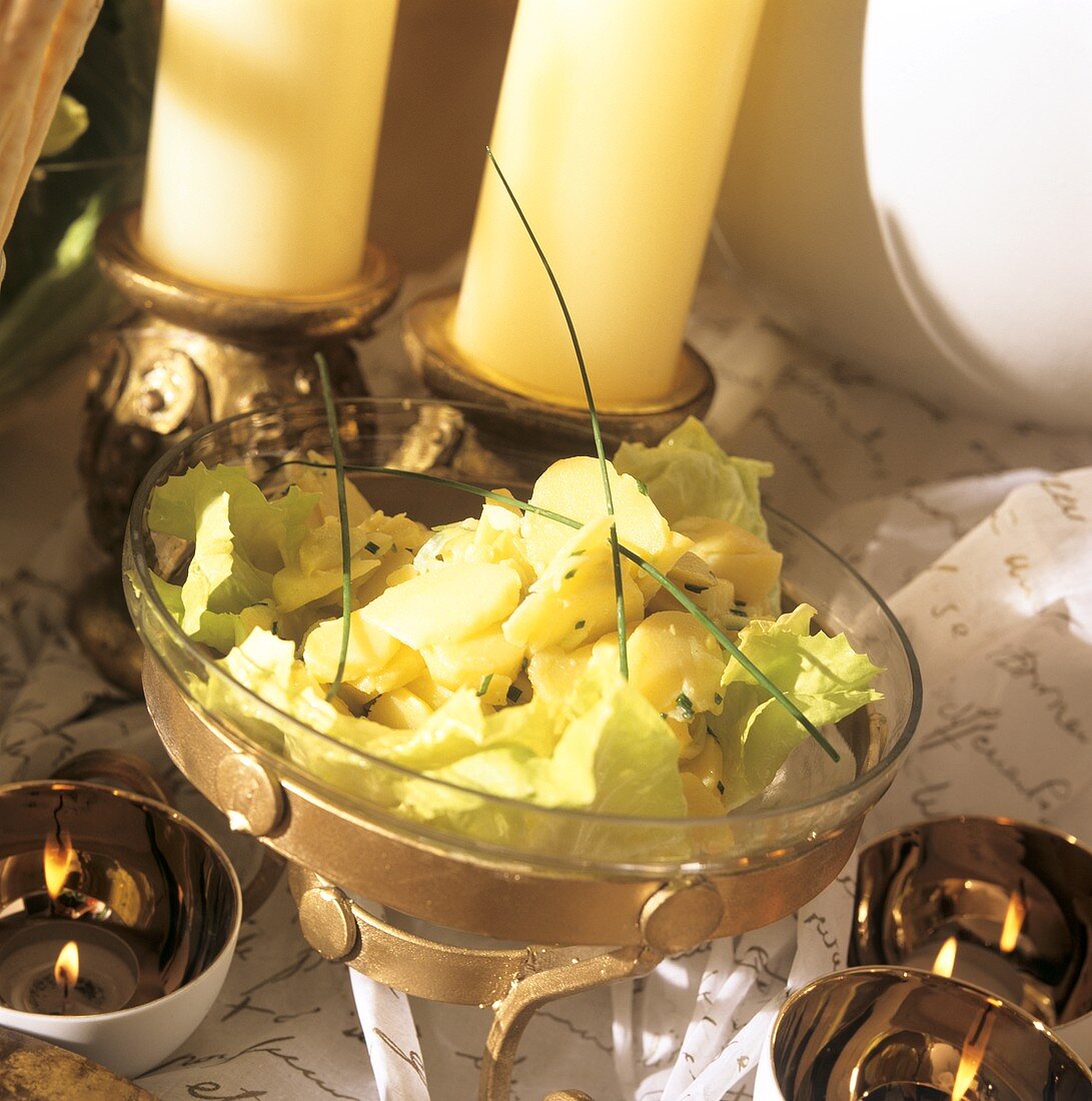 Potato salad in an elegant glass bowl