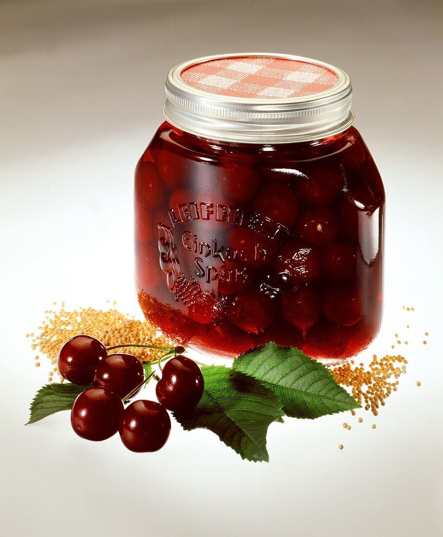 Mustard cherries in preserving jar (eaten with meat dishes)
