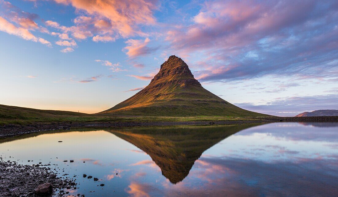 Iceland, Western Region, Grundafjordur, Kirkjufell reflection at sunset