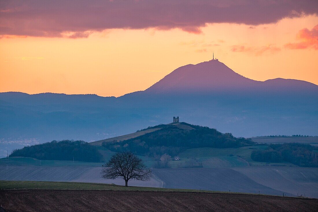 France, Puy de Dome, the Chaine des Puys, area listed as World Heritage by UNESCO, Regional Natural Park of the Auvergne Volcanoes, in the foreground puy of Turluron and Notre Dame de la Salette near Billom
