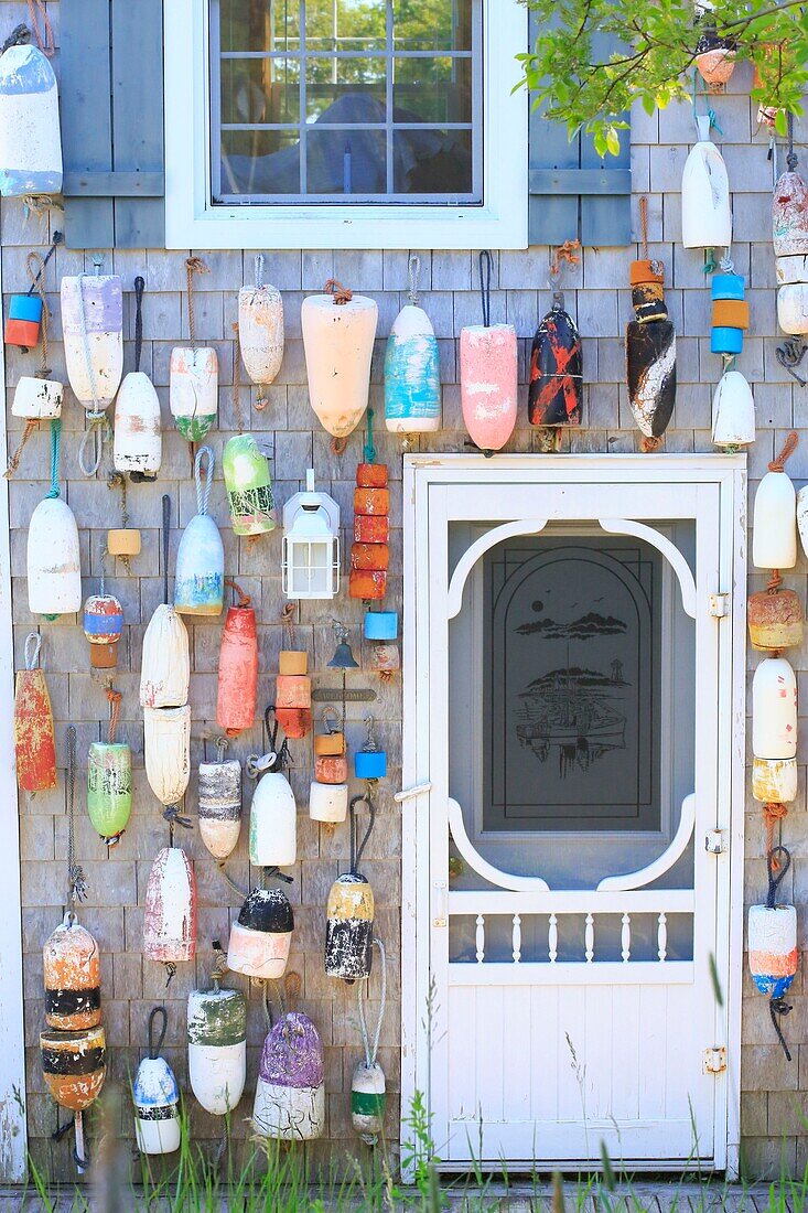 Canada, New Brunswick, Fundy Islands Archipelago, Charlotte County, Bay of Fundy, Deer Island, House Front Decorated with Fishing Floats