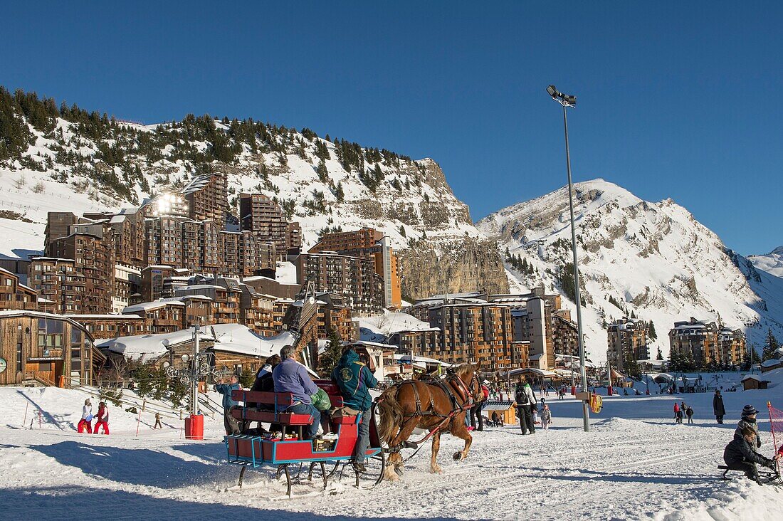 France, Haute Savoie, Chablais Massif, Portes du Soleil ski area, Avoriaz, transport of horse drawn vacationers