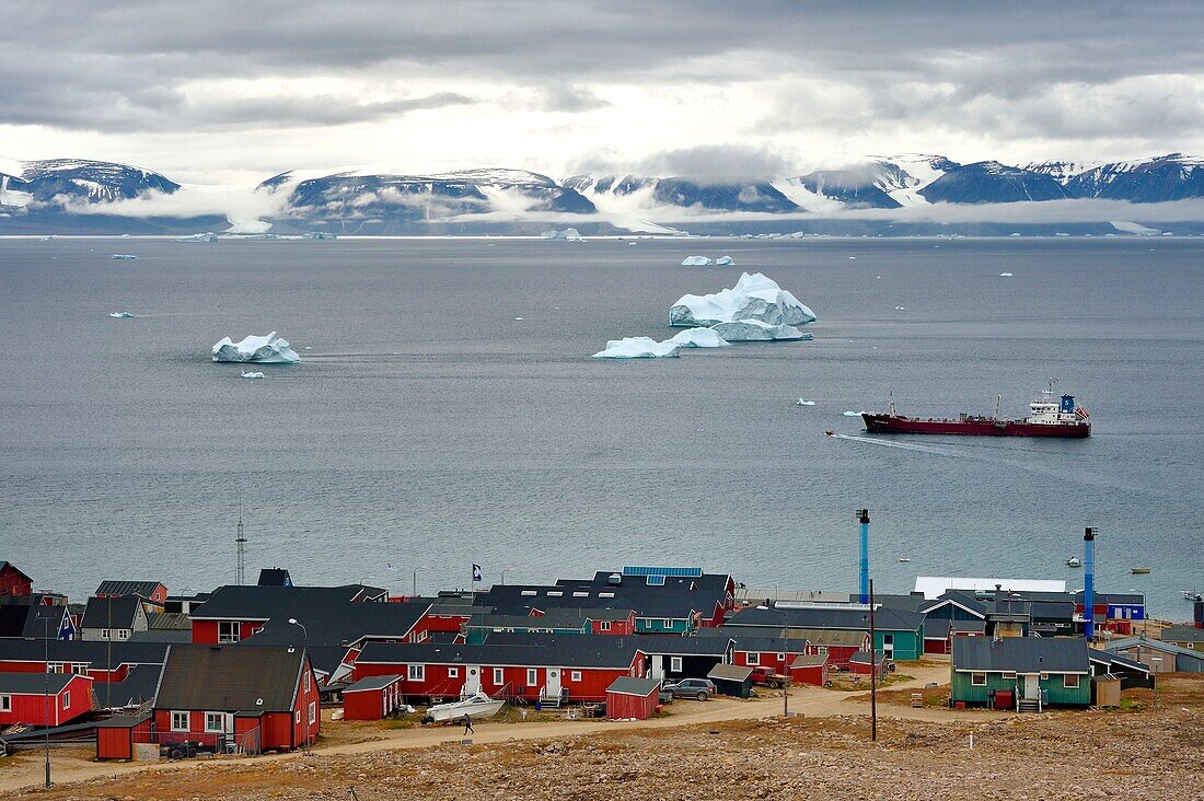 Greenland, North West coast, Baffin Sea, Oil tanker in front of the town of Qaanaaq or New Thule