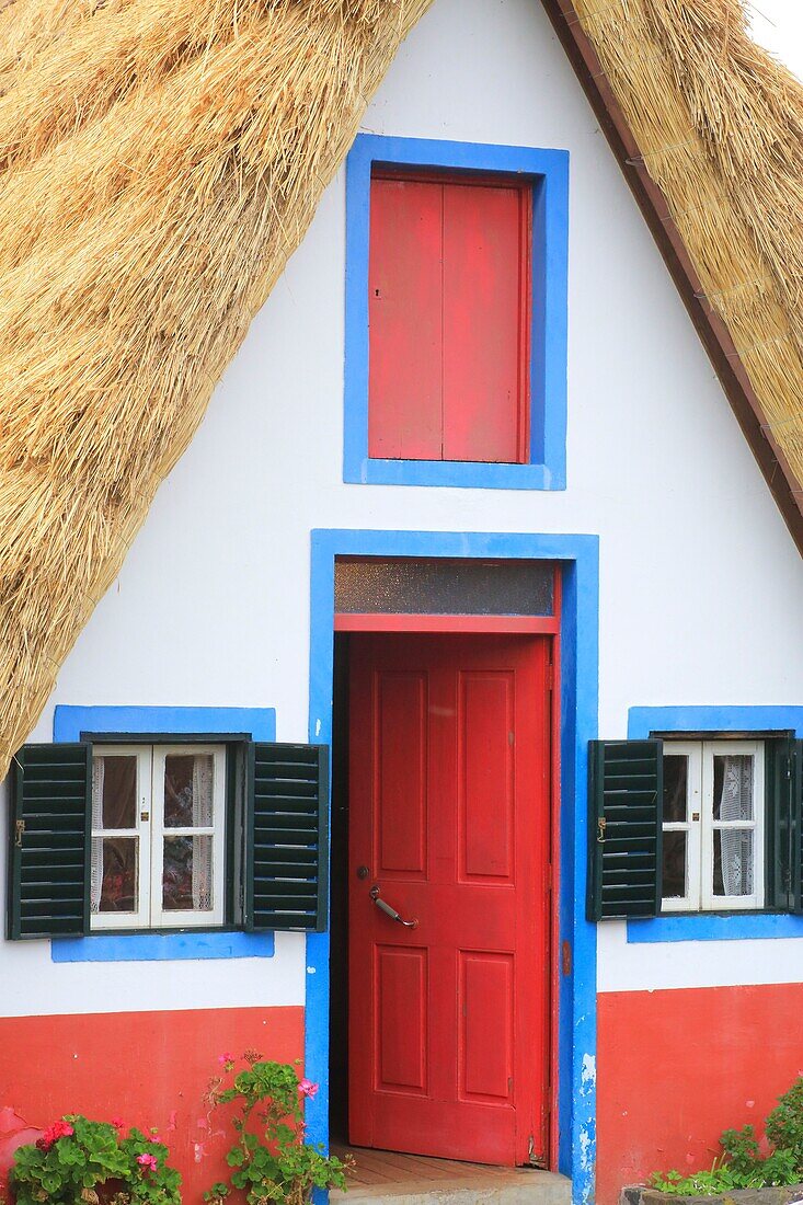 Portugal, Madeira Island, Santana, UNESCO Biosphere Reserve, typical thatched roof house