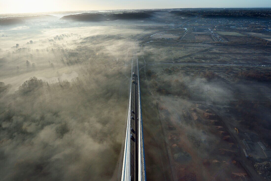 France, between Calvados and Seine Maritime, the Pont de Normandie (Normandy Bridge) at dawn, south access viaduct and Rivière-Saint-Sauveur viewed from the South Pylon