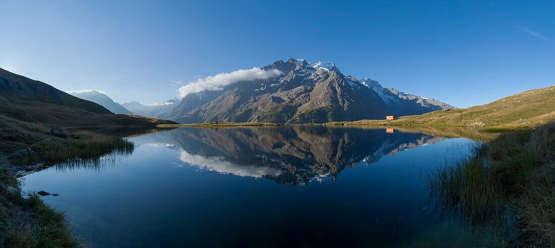 France, Hautes Alpes, The massive Grave of Oisans, panorama of Lake Pontet and Meije