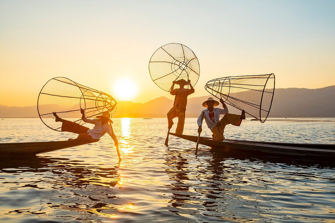 Myanmar (Burma), Shan State, Inle Lake, Intha fishermen with their conical net