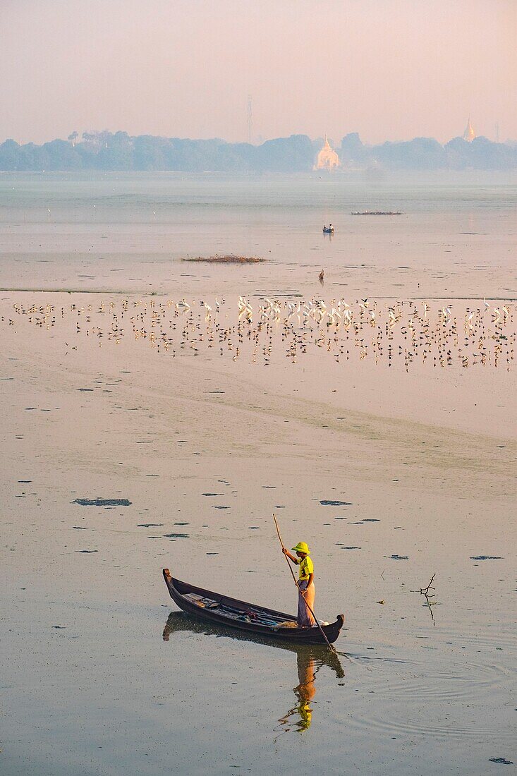 Myanmar (Burma), Mandalay region, Amarapura, the 1.2-mile-long U Bein Teak Bridge, was built in 1849 on Taungthaman Lake