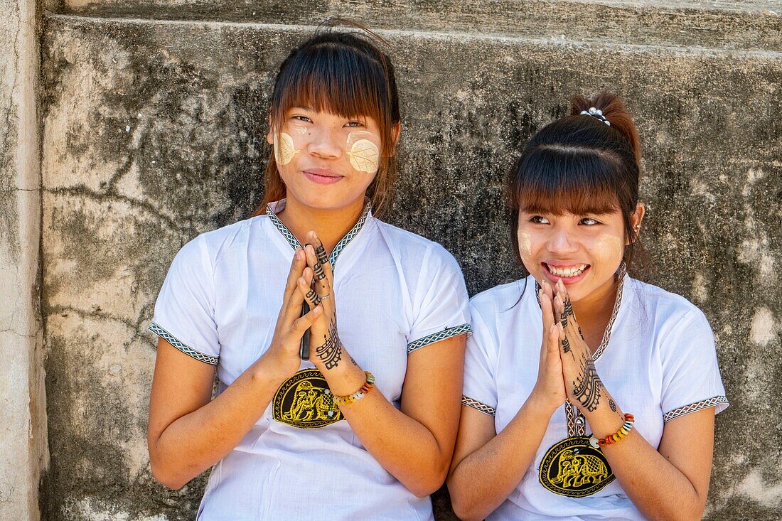 Myanmar (Burma), Mandalay region, Buddhist archeological site of Bagan, young Burmese with Thanaka on the cheeks