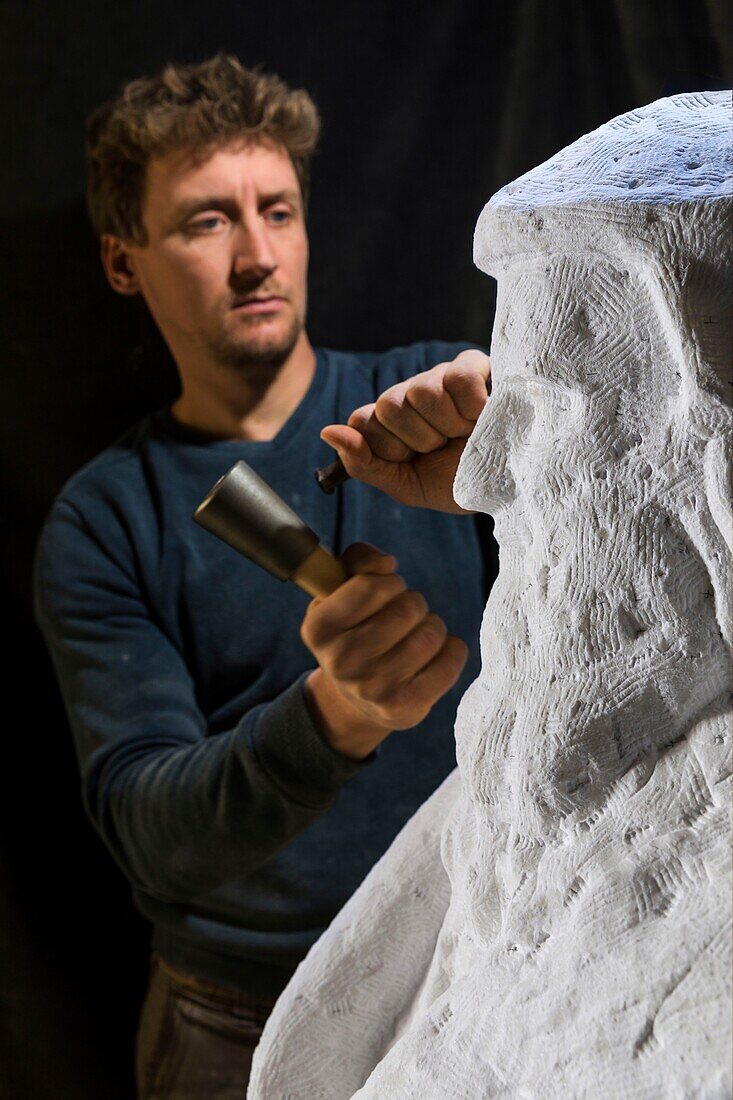 France, Indre et Loire, Chemille sur deme, the sculptor Ianek Kocher sculpting the bust of Leonardo da Vinci in Carrara marble in his workshop for the 500 years of the death of Leonardo da Vinci at the castle of Amboise