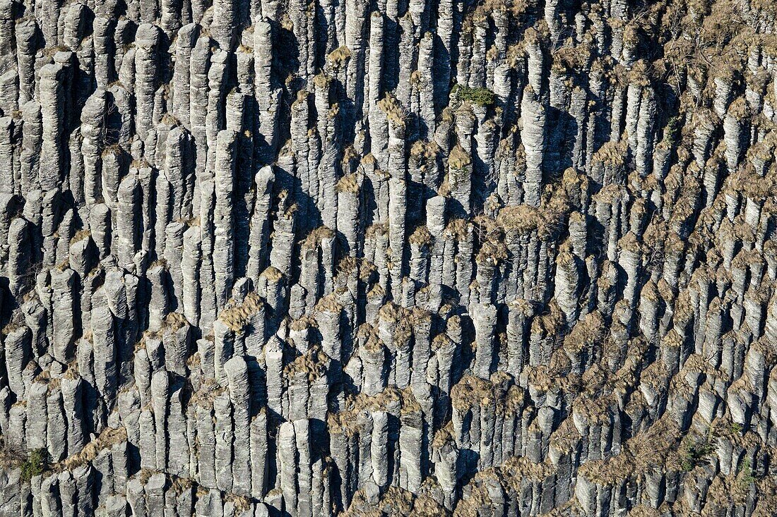 France, Puy de Dome, Orcival, Regional Natural Park of the Auvergne Volcanoes, Monts Dore, Tuiliere rock, volcanic pipe formed phonolite (aerial view)