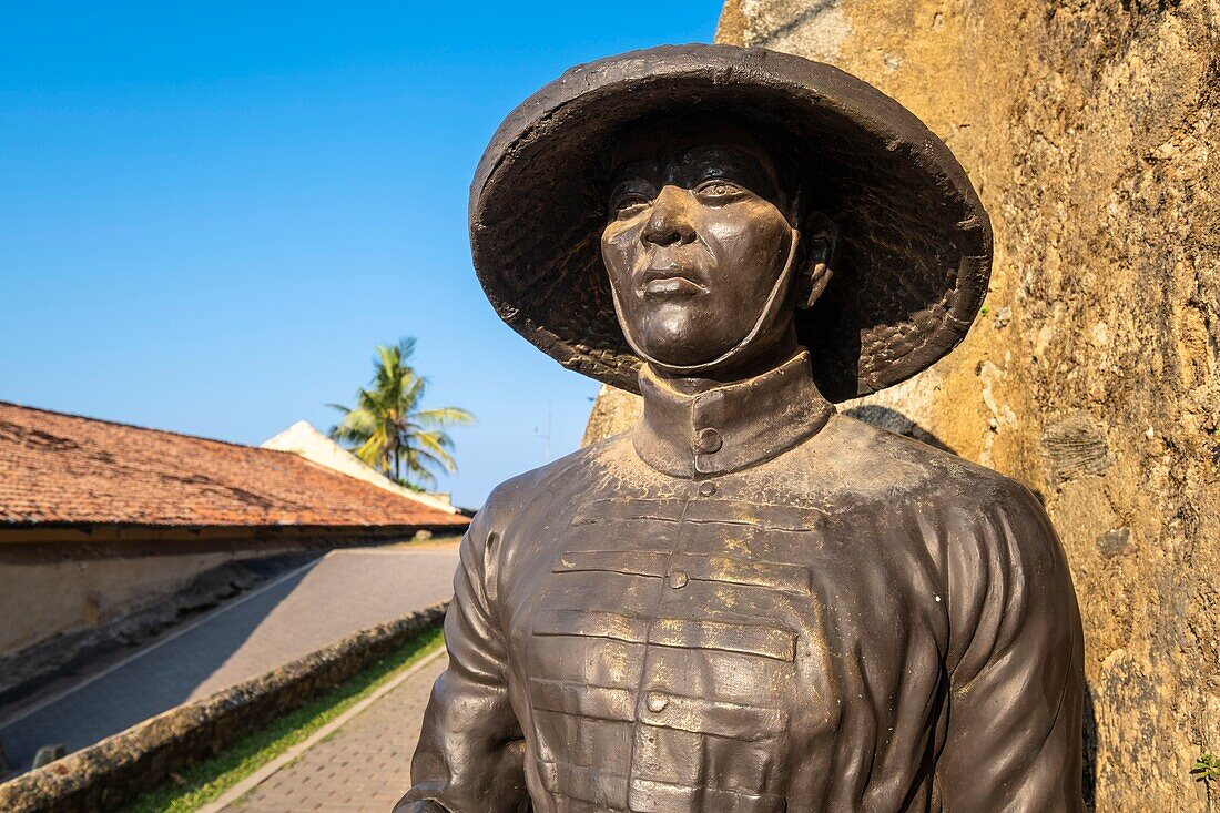 Sri Lanka, Southern province, Galle, Galle Fort or Dutch Fort listed as World Heritage by UNESCO, soldier statue at the Moon Bastion