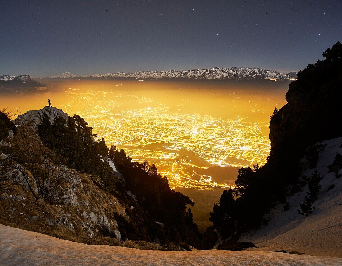 France, Isere, Le Moucherotte, Night view of Grenoble city from the top of Vercors range