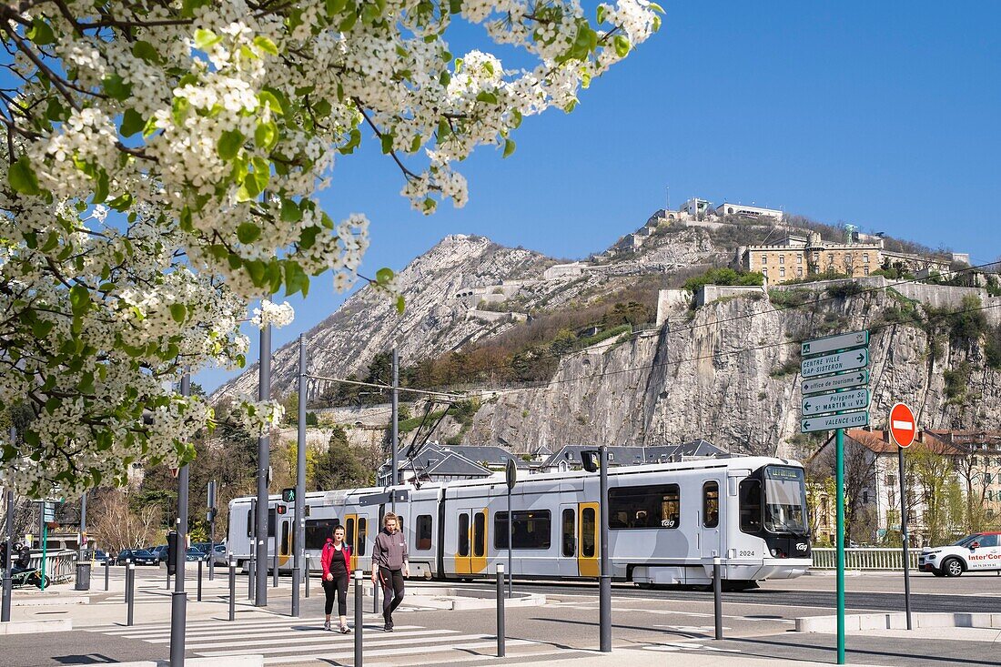 France, Isere, Grenoble, Hubert Dubedout square, Bastille Fort and Rabot Fort in the background