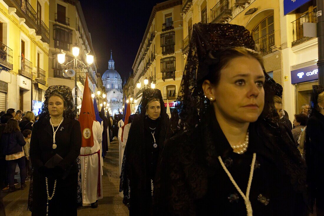 Spain, Aragon Region, Zaragoza Province, Zaragoza, Semana Santa (Holy Week) celebrations, Basilica de Nuestra Senora de Pilar in the background