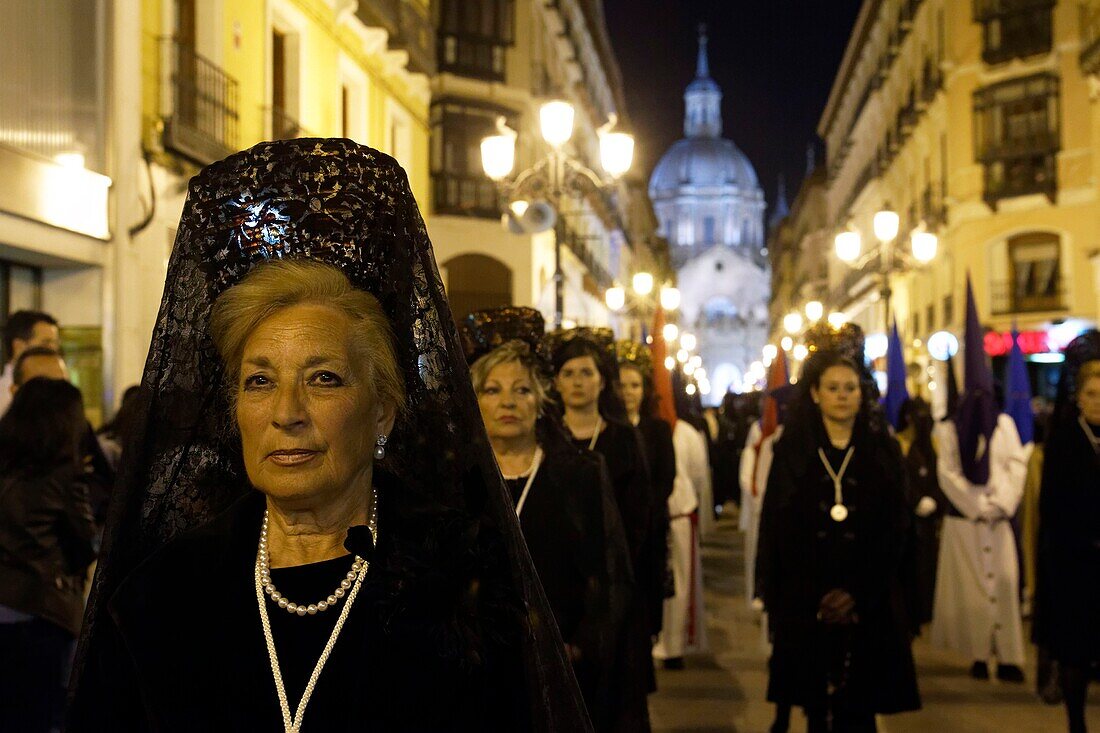 Spain, Aragon Region, Zaragoza Province, Zaragoza, Semana Santa (Holy Week) celebrations, Basilica de Nuestra Senora de Pilar in the background