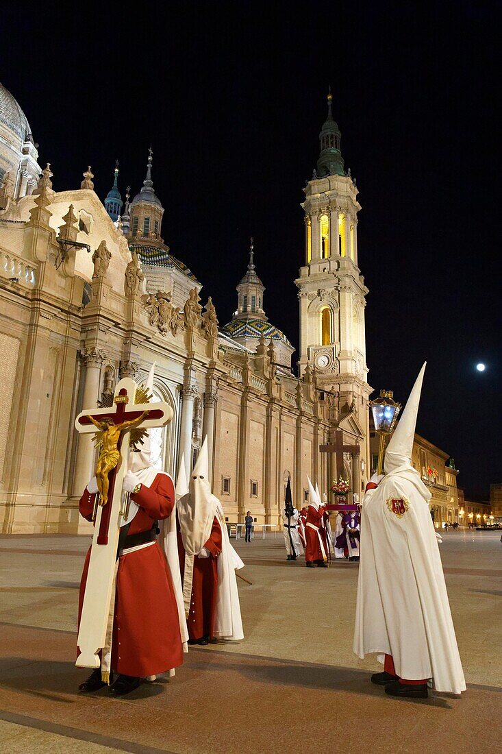 Spain, Aragon Region, Zaragoza Province, Zaragoza, Semana Santa (Holy Week) celebrations, Basilica de Nuestra Senora de Pilar in the background