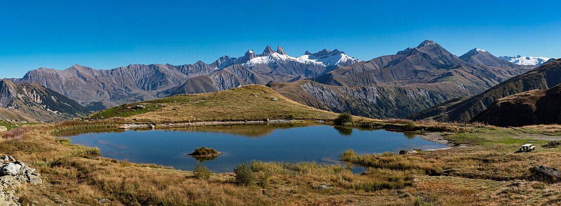 France, Savoie, Saint Jean de Maurienne, the largest bike trail in the world was created within a radius of 50 km around the city. under the Iron Cross Pass, panoramic view of Lake Laitelet and the needles of Arves