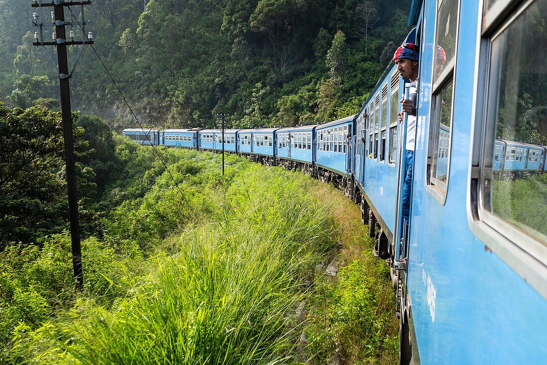 Sri Lanka, Uva province, the train line that connects Badulla to Kandy crossing mountain regions and tea plantations