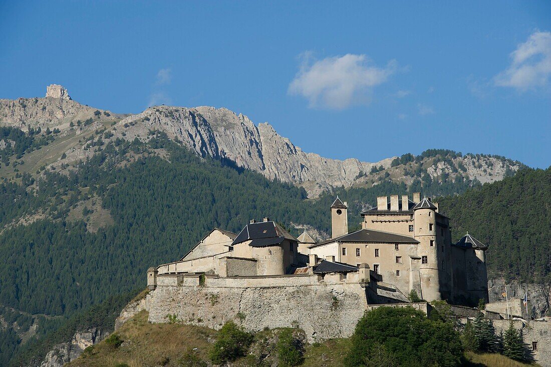 France, Hautes Alpes, Queyras massif, Saint Veran, at the bottom of the valley of Guil castle fortress Queyras and the tooth of Ratier (2660m)