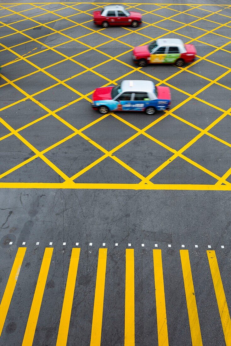 Hong Kong, Hong Kong Island, pedestrian crossing close to the Star ferry terminal on Hong Kong island