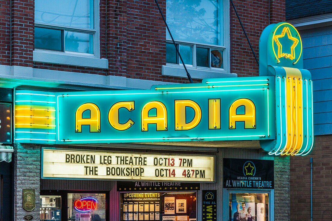 Canada, Nova Scotia, Annapolis Valley, Wolfville, Acadia Theater, neon marquee, dusk