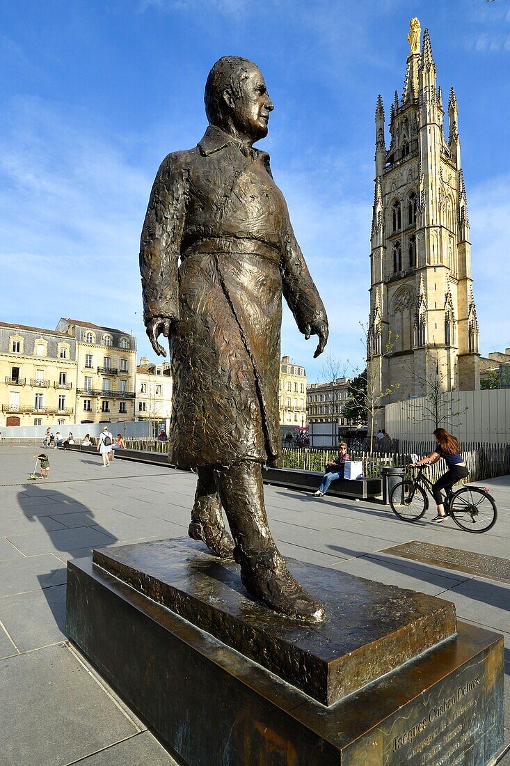 France, Gironde, Bordeaux, area listed as World Heritage by UNESCO, district of the Town Hall, Pey Berland Square, statue representing Jacques Chaban-Delmas by Jean Cardot and the tower Pey Berland, the bell tower of the Saint Andre cathedral