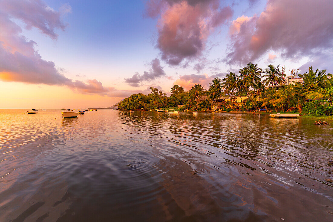 View of Case Noyale at sunset, Le Morne, Riviere Noire District, Mauritius, Indian Ocean, Africa