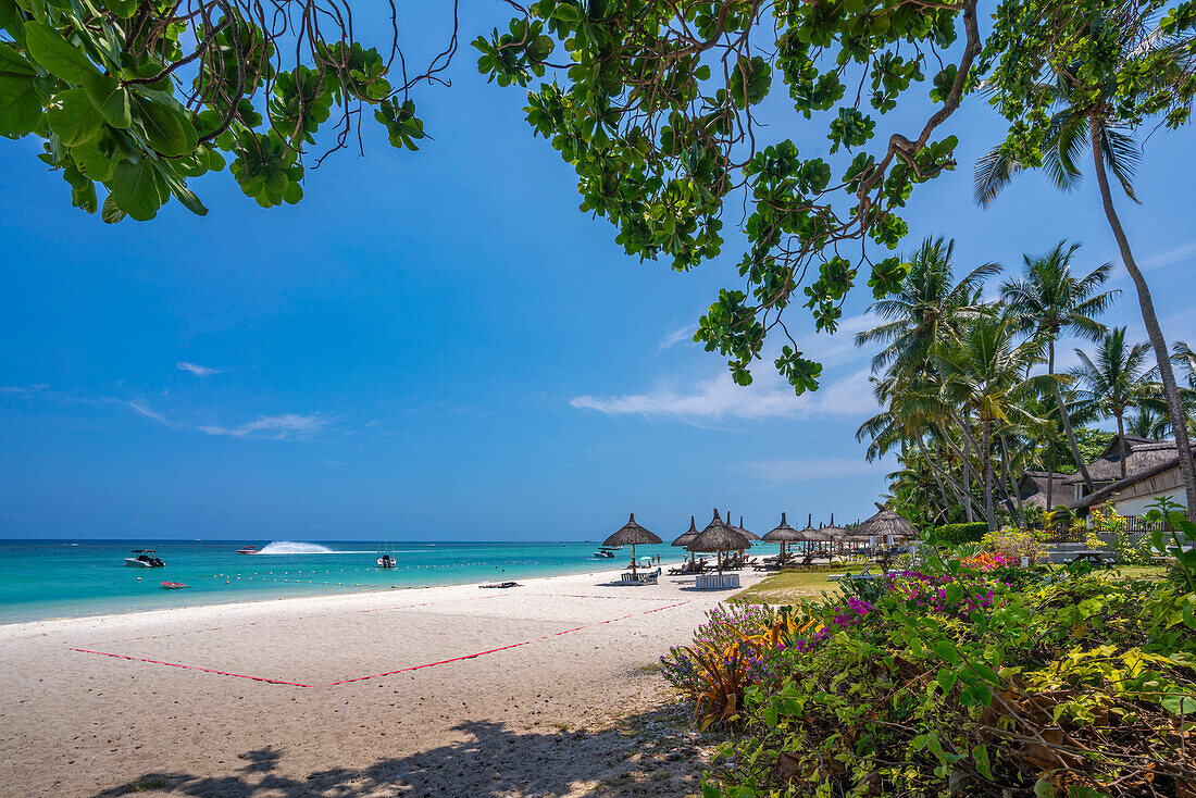 View of Beach at Trou-aux-Biches and turquoise Indian Ocean on sunny day, Trou-aux-Biches, Mauritius, Indian Ocean, Africa