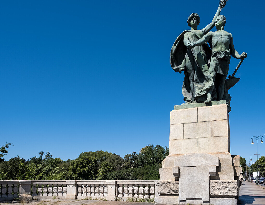 Architectural detail of statues adorning the Umberto I Bridge, spanning the Po River, Turin, Piedmont, Italy, Europe