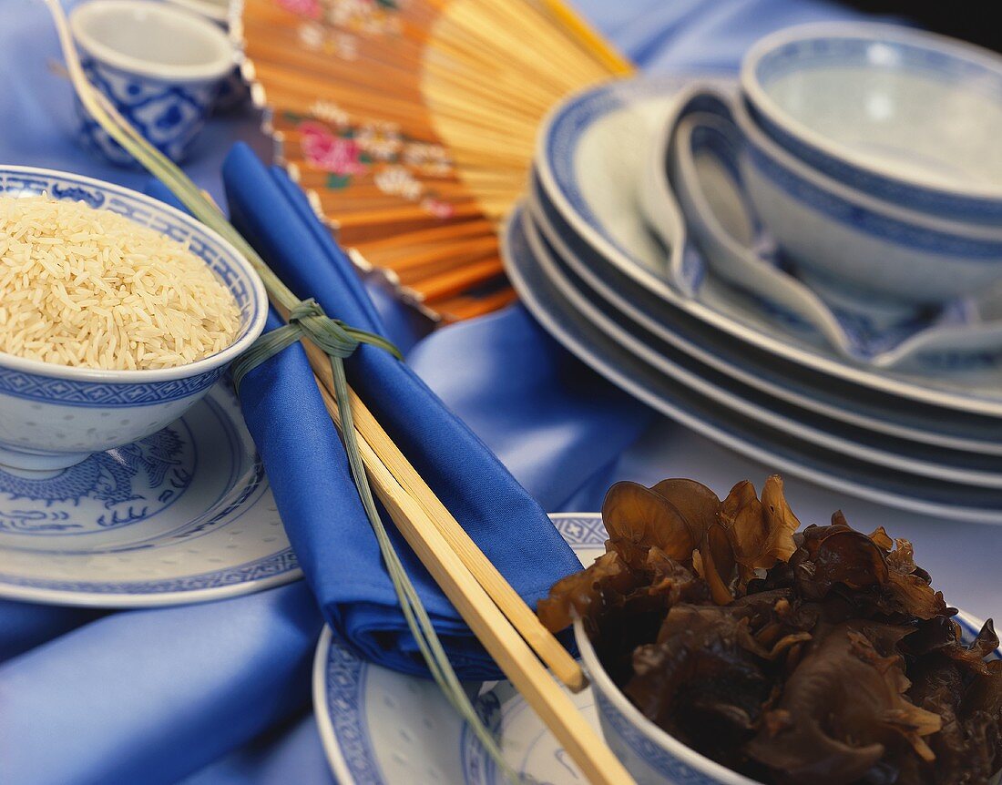 Bowl of raw rice, Mu-err mushrooms & Chinese table decoration