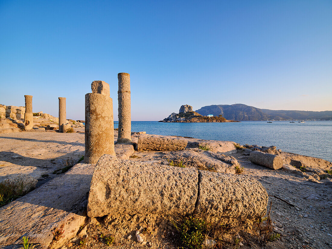 St. Stefanos Basilica Ruins and Kastri Island at sunset, Agios Stefanos Beach, Kos Island, Dodecanese, Greek Islands, Greece, Europe