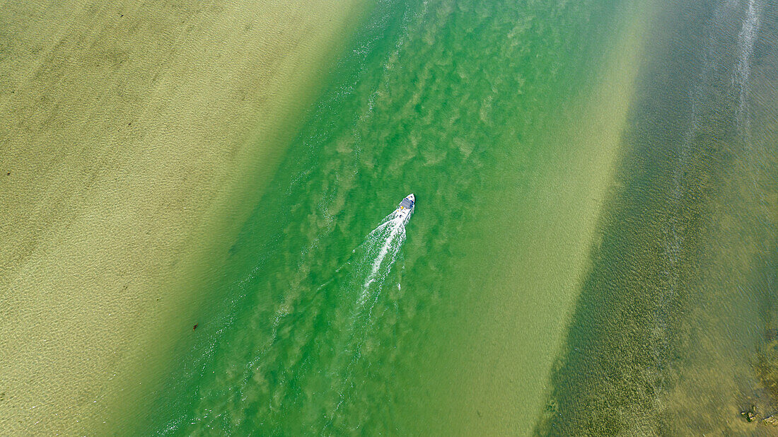 Boat in the turquoise waters of the Klein River Lagoon, Hermanus, Western Cape Province, South Africa, Africa