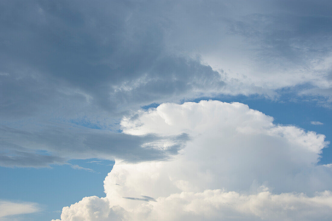 Thunderstorm clouds gathering on sky