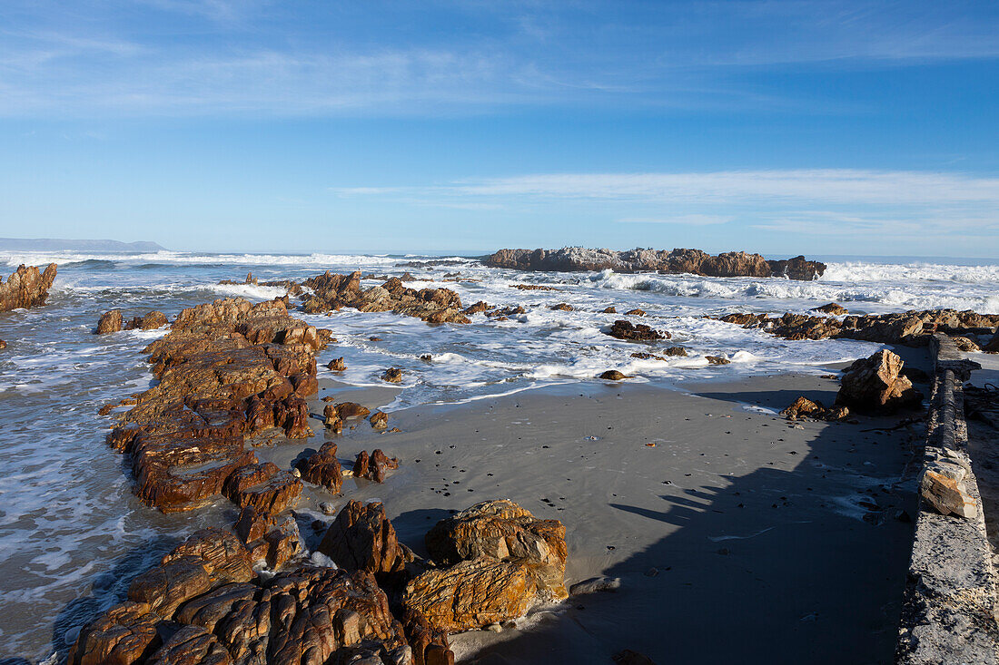 South Africa, Hermanus, Waves washing against rocks on Kammabaai Beach