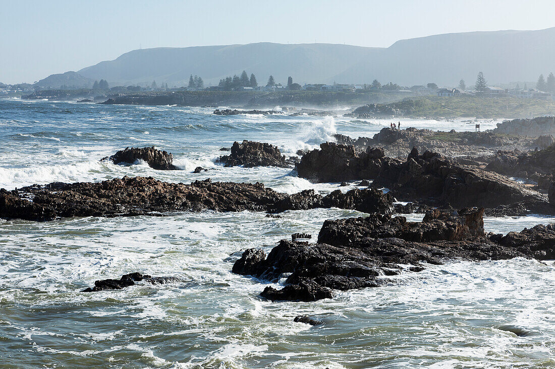 South Africa, Hermanus, Rocky coastline and sea at Kammabaai Beach