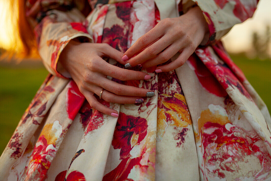 Mid section of woman wearing beautiful dress